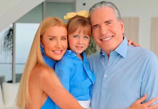 Filha caçula de Roberto Justus combina look grifado com os pais